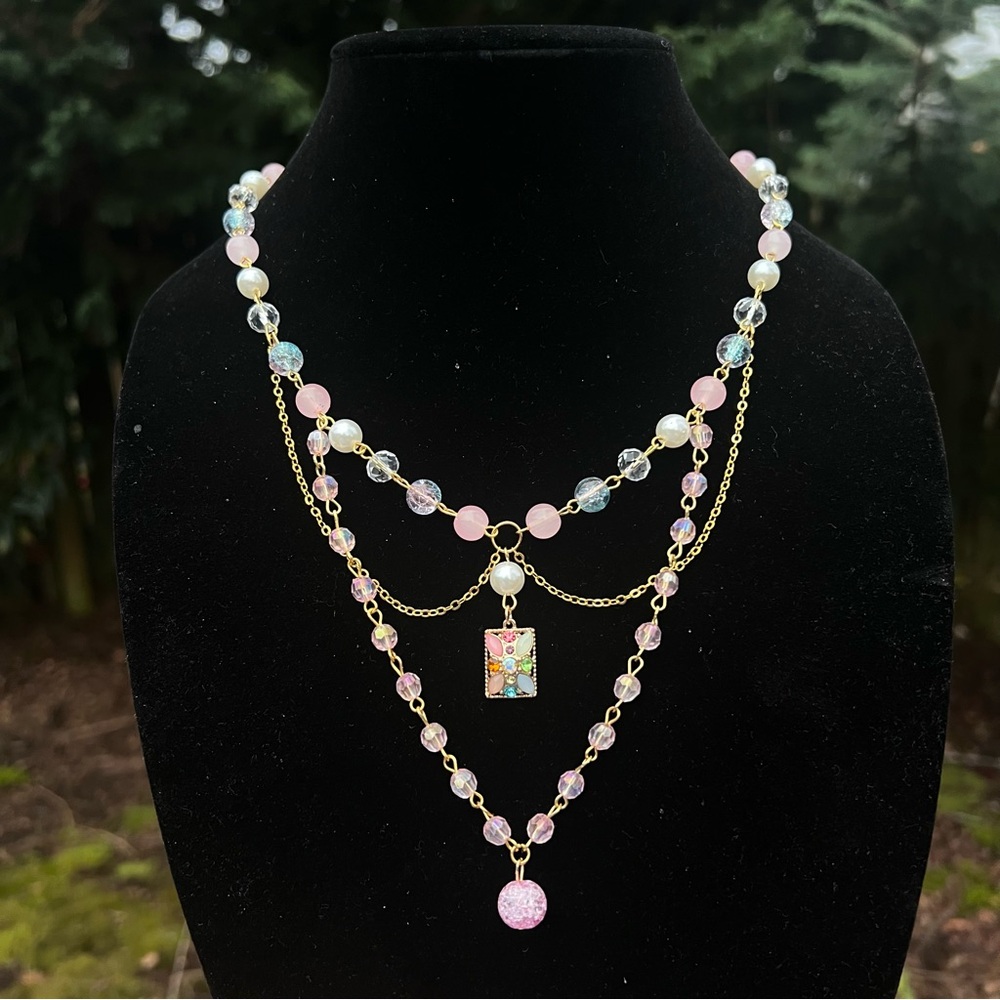 Elegant Multi-Layered Necklace with Pink, blue and Gold Accents